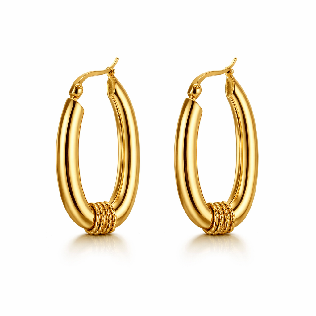 Gold hoop earrings on a white background